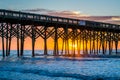 The pier at sunrise, in Folly Beach, South Carolina Royalty Free Stock Photo