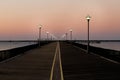 Sunset beach pier lamppost Royalty Free Stock Photo