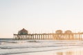 The pier at sunset, in Huntington Beach, Orange County, California Royalty Free Stock Photo