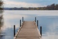Pier to Danish lake Farum Lake - autum season Royalty Free Stock Photo