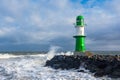 Pier tower on shore of the Baltic Sea during the storm Eunice in Warnemuende, Germany