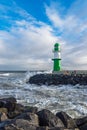 Pier tower on shore of the Baltic Sea during the storm Eunice in Warnemuende, Germany