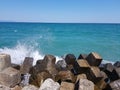 Pier of the town of Pomorie / Bulgaria, covered with breakwaters around, which protects the beach and the city from strong waves. Royalty Free Stock Photo