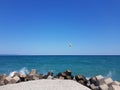 Pier of the town of Pomorie / Bulgaria, covered with breakwaters around, which protects the beach and the city from strong waves. Royalty Free Stock Photo