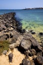 Pier village water boat yacht coastline and summer lanzarote