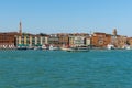 Pier and walkway in Schiavoni and the San Francesco area and Vigna Bell Tower reaches high above in Venice, Italy