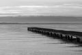 Pier and water reflections Royalty Free Stock Photo