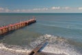 Pierce, breakwater and sea after last night`s storm. Adler, Sochi, Russia Royalty Free Stock Photo