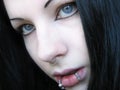 Pierced girl with blue eyes Royalty Free Stock Photo