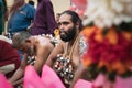 Pierced Hindu devotees resting at the Thaipusam festival in Georgetown, Penang, Malaysia