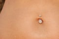Piercing in a navel Royalty Free Stock Photo
