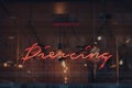 Piercing neon sign in a window of Rachels salon in East End of London, UK Royalty Free Stock Photo