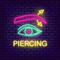 Piercing studio neon light sign. Pierced eyebrow Royalty Free Stock Photo