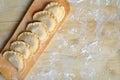 pierogi on a rustic wooden board