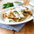 Pierogi with sour cream