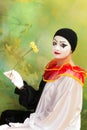 Pierrot clown with flower