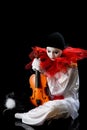 Pierrot with violin Royalty Free Stock Photo