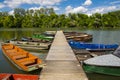 Piert and old boats in the river of Tisza at Martely
