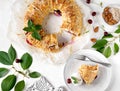 a pies of freshly baked cherry strudel with ice cream on plate with mint and almond and fresh cherries at the background Royalty Free Stock Photo