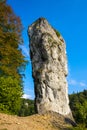 Pieskowa Skala, Poland - Monumental limestone rock Cudgel or Bludgeon of Hercules - Maczuga Herkulesa - in the Ojcowski National Royalty Free Stock Photo