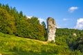 Pieskowa Skala, Poland - Monumental limestone rock Cudgel or Bludgeon of Hercules - Maczuga Herkulesa - in the Ojcowski National Royalty Free Stock Photo