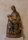 The Pieta made of poplar with paint and gilding circa 1400 on display in the Cloisters in New York City. Royalty Free Stock Photo