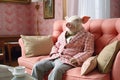 A pig dressed in casual clothes lies in a sofa at home, concept of Funny animal, created with Generative AI technology