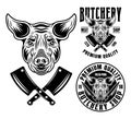 Pig head and two butchery shop emblems, badges, labels or logos vector monochrome illustration in vintage style isolated Royalty Free Stock Photo
