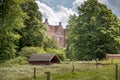 Pig house is seen behind the buildings at Gammel Estrup Castle