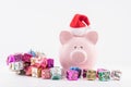 Pig money box and Christmas gift boxes, the concept of richness and wealth in the upcoming year Royalty Free Stock Photo