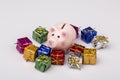 Pig money box between christmas gift Royalty Free Stock Photo