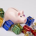 Pig money box between christmas gift Royalty Free Stock Photo