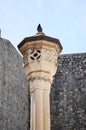 Pigeon on column in the old town of Dubrovnik