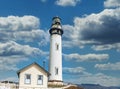 Pigeon Point lighthouse against the backdrop of a beautiful sky and ocean with waves, a great landscape of the Pacific coast in Royalty Free Stock Photo