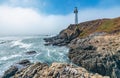 Pigeon Point lighthouse against the backdrop of a beautiful sky and ocean with waves, a great landscape of the Pacific coast in Royalty Free Stock Photo