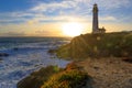 Pigeon Point Lighthouse on Northern California Pacific Ocean coastline just before sunset with an artistic sun flare, vintage look Royalty Free Stock Photo