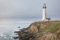 Pigeon Point Lighthouse surrounded by the Pacific Ocean in California Royalty Free Stock Photo