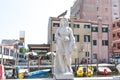 Pigeon resting on the head of a statue in Chioggia, Italy, august 2016 Royalty Free Stock Photo