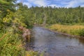 The Pigeon River flows through Grand Portage State Park and Indian Reservation. It is the Border between Ontario and Minnesota Royalty Free Stock Photo