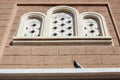 Pigeon standing on orthodox church window. Royalty Free Stock Photo