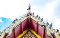 Pigeon on Thai temple roof with blue sky Royalty Free Stock Photo