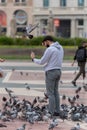 Pigeons in Plaza CataluÃÂ±a empty without tourists in times of the Covid in 2021