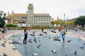 Pigeons and tourists in Catalonia Plaza, Barcelona