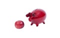 Piggy bank and an apple