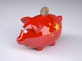 Piggy bank with China flag and golden yuan coin Royalty Free Stock Photo