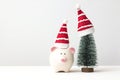 Piggy bank, christmas tree and santa claus hat
