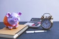 Piggy bank clock calculator Royalty Free Stock Photo