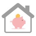 Piggy bank with coin in a house isolated on white background Royalty Free Stock Photo