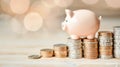 Piggy bank and coin stack on bokeh background, saving money for prepare in the future Royalty Free Stock Photo