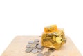 Piggy bank and coin on top table wood with isolated background. Royalty Free Stock Photo